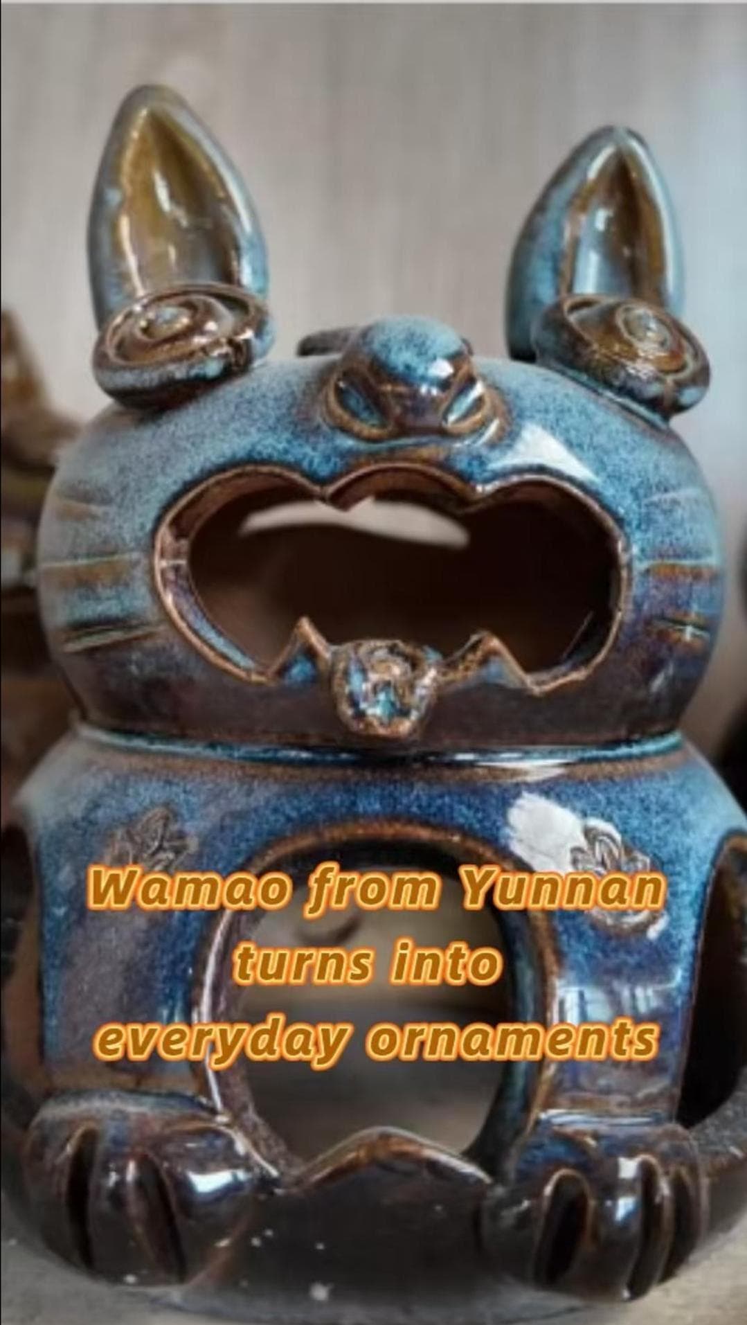 ช่างฝีมือแปลงร่างรูปปั้นแมว 'หว่ามาว' จากเครื่องรางสู่ของตกแต่ง