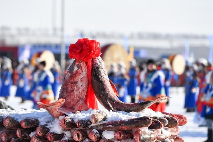 เทศกาล 'จับปลาฤดูหนาว' ดึงดูดนักท่องเที่ยวในจี๋หลิน