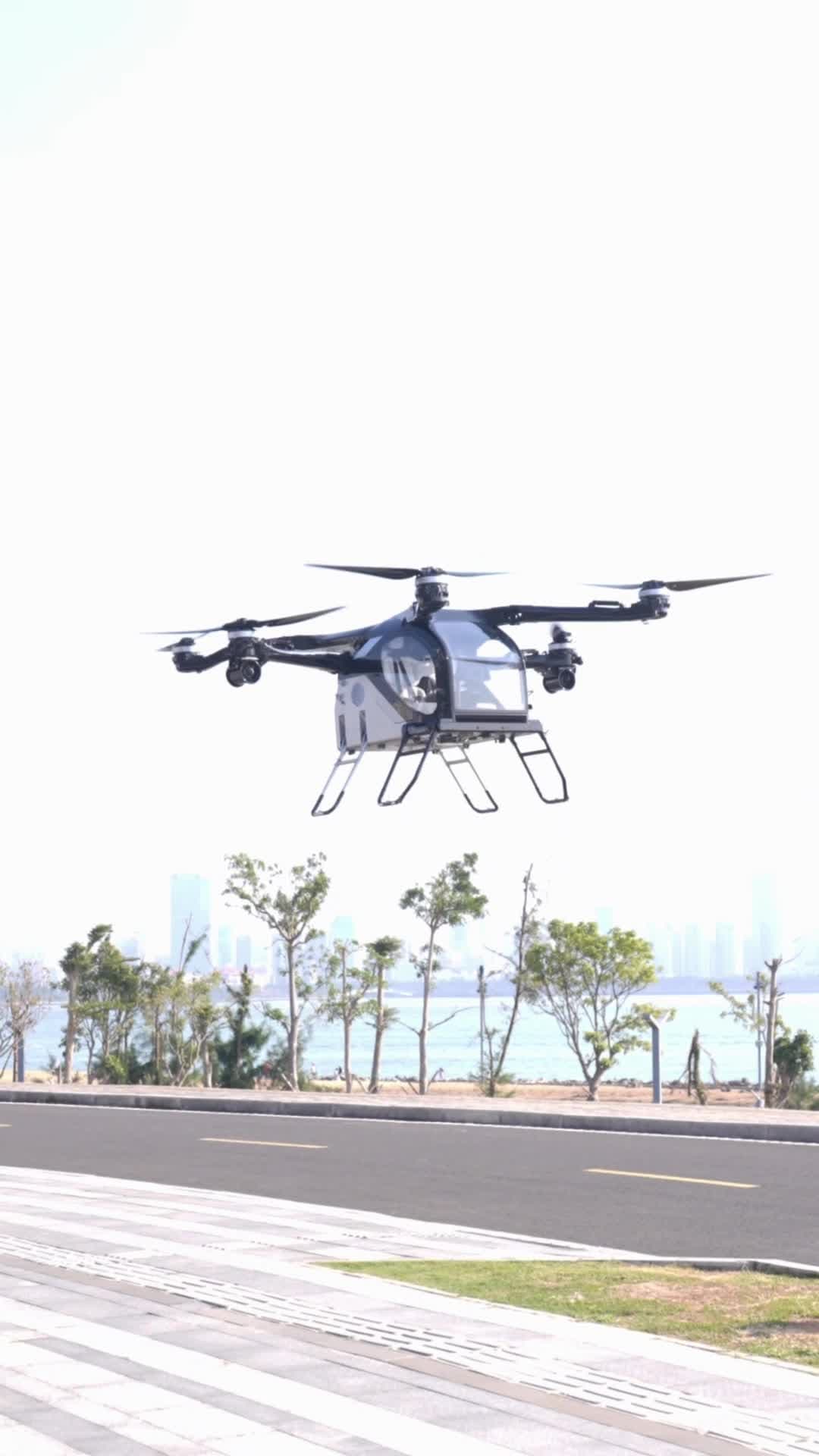 รถยนต์บินได้' แบบแยกส่วน ฝีมือจีน สาธิตขึ้นบินในไหหลำ