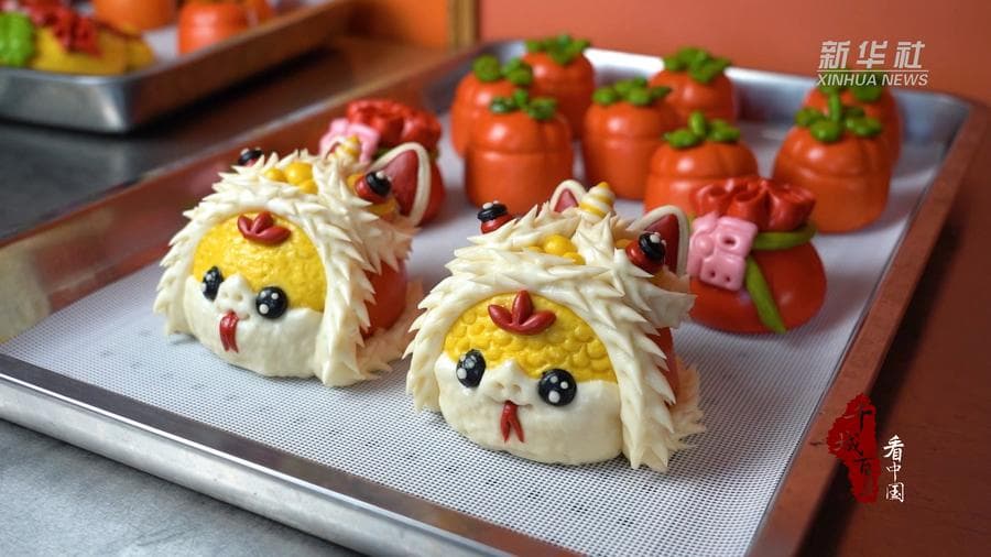 งานศิลป์กินได้ 'ฮวาโม๋' หมั่นโถวสีสวย ส่งคำอวยพรปีใหม่จีน