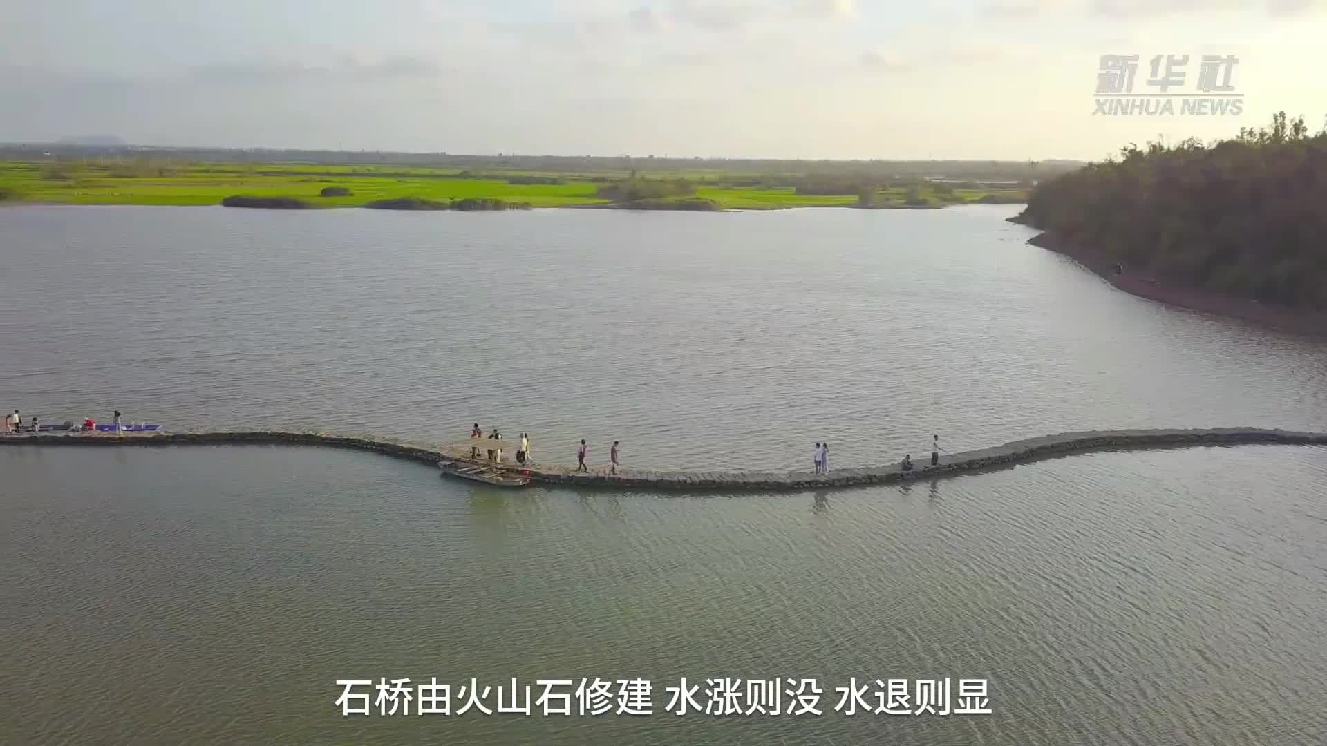 ผุดแล้ว! 'สะพานงู' เก่า 500 ปีในไหหลำ โผล่ให้เดินเฉพาะฤดูใบไม้ผลิ-ร้อน