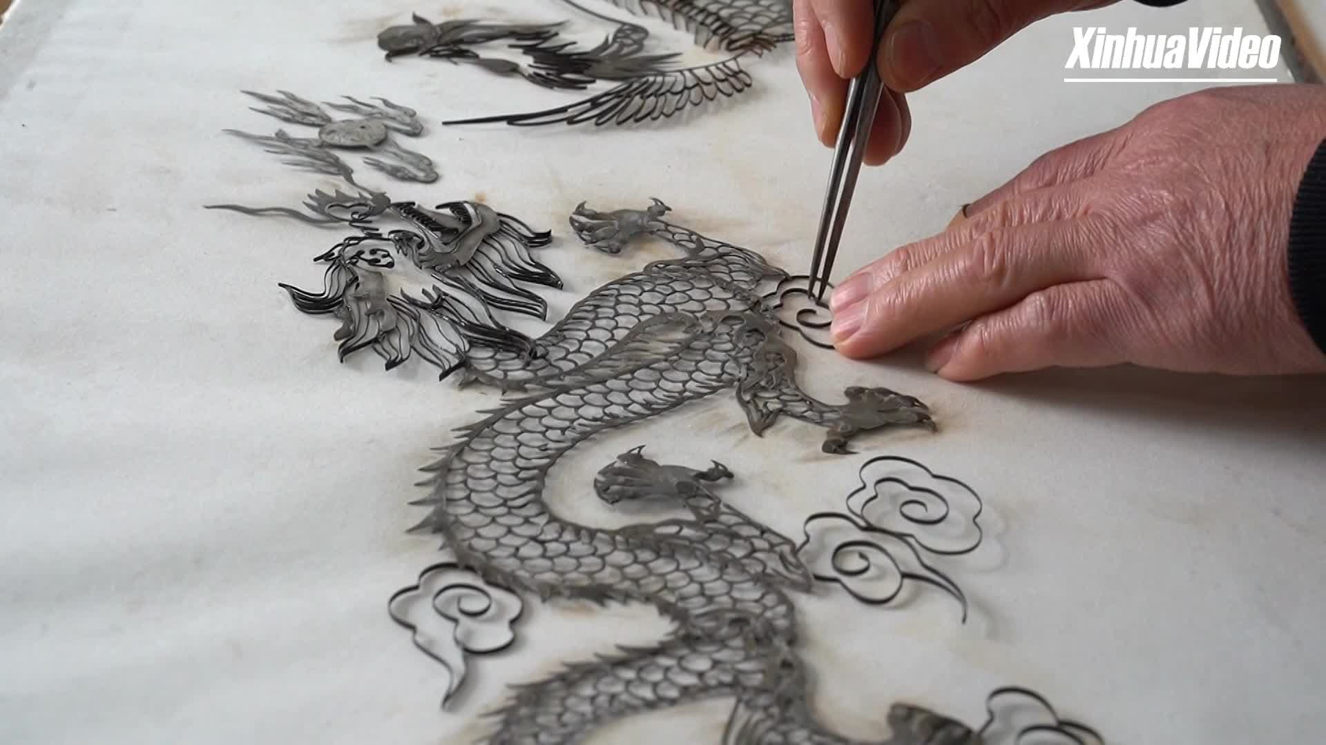 หล่อเหล็กเป็นหมึก สร้างสรรค์ 'ภาพวาด' งามศิลป์ในจุนฮว่า