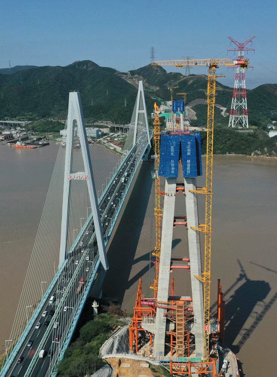 งานปิดยอดหอคอยหลัก 'สะพานทางหลวง-ทางรถไฟ' ในเจ้อเจียง