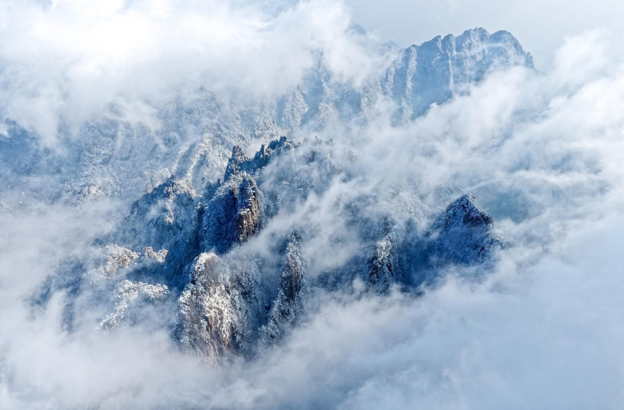 ขุนเขาหวงซานหลังหิมะตก งดงามราวแดนมหัศจรรย์